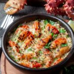 Baked crabmeat crab meat with cheese, cream and bread.