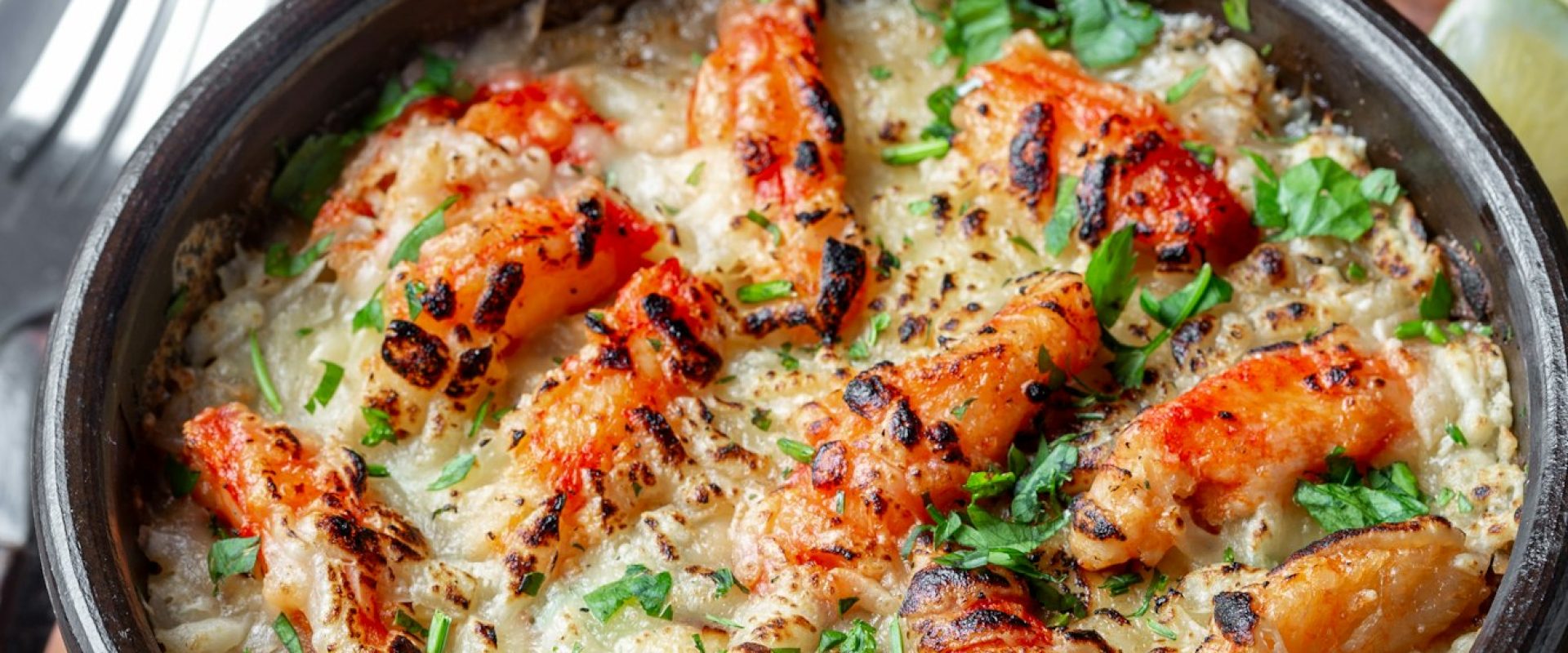 Baked crabmeat crab meat with cheese, cream and bread.